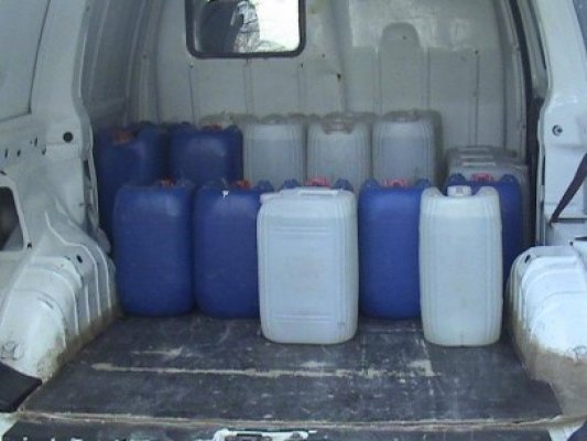 Prins în timp ce transporta ilegal 452 litri de alcool
